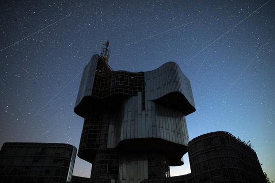 Perseids Meteor Shower Next To Monument To The Uprising Of The People In Petrova Gora In Croatia In Dark Night Full Of Stars