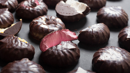 Background from marshmallows. Broken, cut, cracked, whole