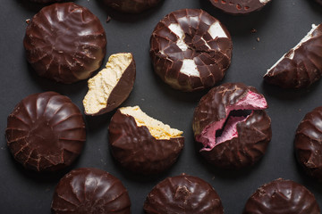 Background from marshmallows. Broken, cut, cracked, whole