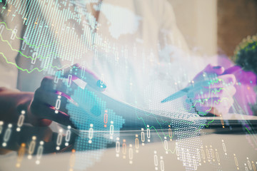 Financial chart drawn over hands taking notes background. Concept of research. Multi exposure
