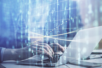 Businessman with computer background with technology theme hologram. Concept of big data. Double exposure.