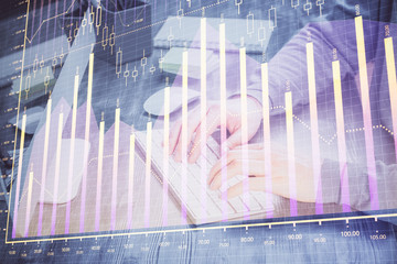 Double exposure of financial graph with man works in office on background. Concept of analysis.