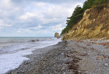 The Black Sea coast in the vicinity of the village of Praskoveevka, in the distance is visible the rock Parus. Krasnodar region, Russia