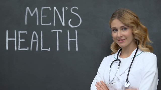 Confident female doctor standing near men health phrase, disease prevention
