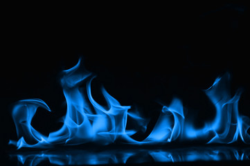 Beautiful fire blue flames on a black background.