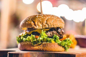 Complete hamburger made by the hand of a chef