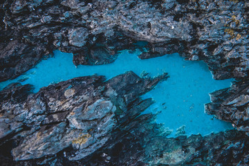 Naklejka na ściany i meble Crystal blue lake in mountains aerial view