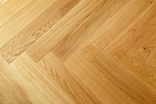Seamless wood parquet texture, chevron sand color