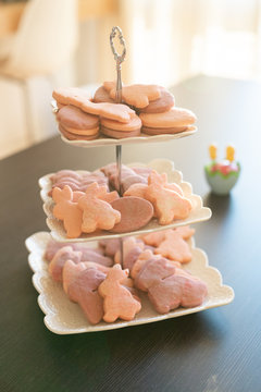 Pink And Purple Easter Sugar Cookies On Tiered Tray