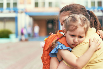 the little girl stress she does not want to leave her mother.