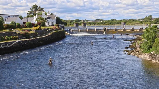 Fisherman in Corrib river in Salmon season, Galway, Ireland