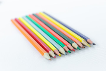 Fototapeta premium Color pencils on a white background isolated.