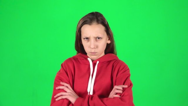 Girl is changing her mood. Firtly she is angree disagree and then happy. Slow motion