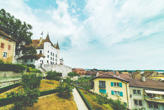 Castle on hill, ton houses and blue sky