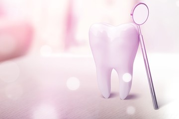 White tooth and dentist mirror with pastel pink color