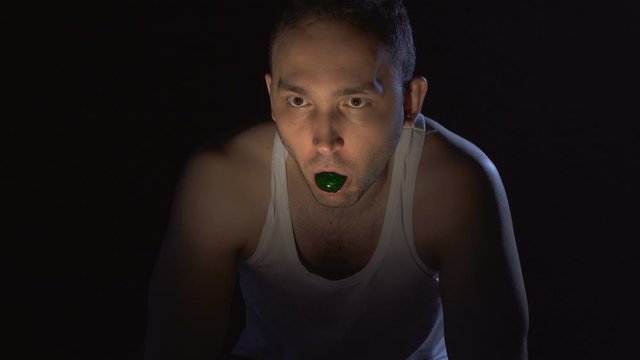 Madman With Green Mucus In Mouth