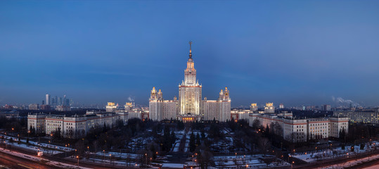 Panoramic top view of the building of Moscow State University in the winter evening. Moscow, Russia