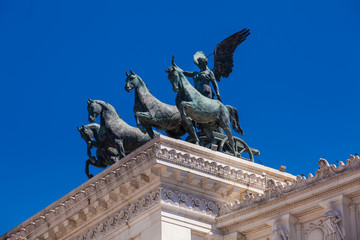 Naklejka premium Detail of the statues of The Vittorio Emanuele II Monument also called Altare della Patria a monument built in honor of Victor Emmanuel II the first king of a unified Italy