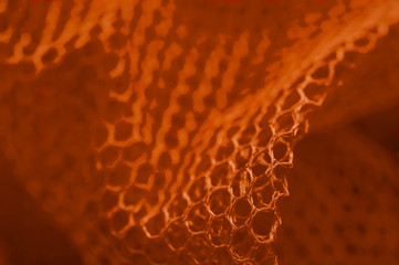Abstraction. Grid. Orange color. Patterned composition. The waves. The average plan.