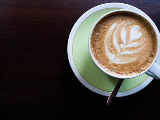 Cappuccino or latte coffee with shape, copy space
