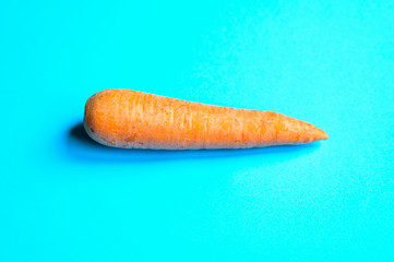 Carrot on a blue background