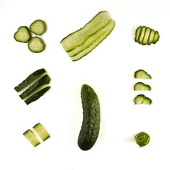 Seamless pattern with green fresh cucumber. Food collage, black background. Slicing.