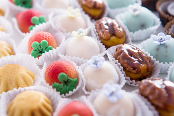 Marzipan on glass tray in white background