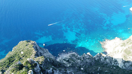 Aerial drone bird's eye view photo of tropical caribbean paradise rockybay with turquoise clear sea