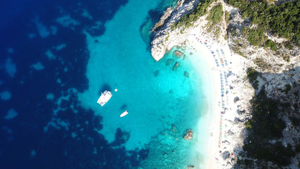 Aerial drone photo of iconic paradise sandy beach of Agiofili near port of Vasiliki with emerald crystal clear sea and sail boats docked, Lefkada island, Ionian, Greece