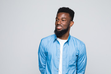 Young african american man over isolated gray background
