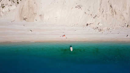 Aerial drone photo of iconic paradise beach of Egremni with white rock steep cliff and emerald clear sea, Lefkada island, Ionian, Greece