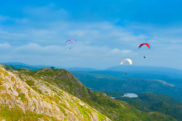 Beautiful landscape with paragliders seen from the Mount Ulriken in Bergen, Norway, on August 4 2019