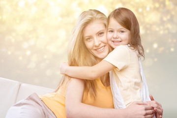 Happy Mother and daughter hugging on background