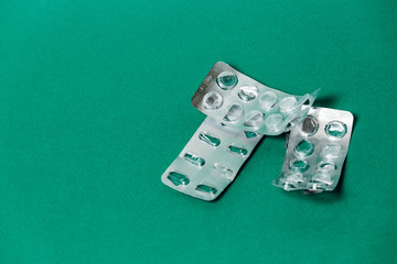 empty medicine packaging on the table