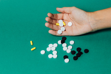 eruptive pills and vitamins from the palm of your hand