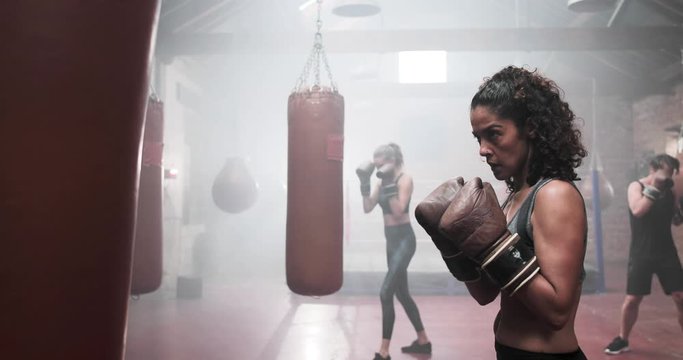 Adult female in a boxing fitness class