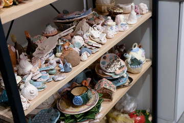 Photo of clay crafts that children dazzled in the classroom. Many crafts from clay. Examples of crafts made of clay. Children's creativity