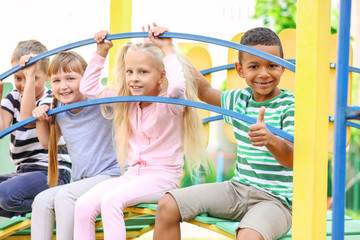 Fototapeta na wymiar Cute little children on playground