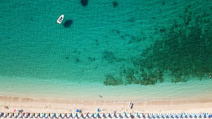 Aerial drone photo of natural beauty bay and sandy beach of Valtos with watersports facilities and emerald sea. Parga, Epirus