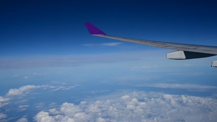 Wing of air plane in sky 