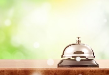 Vintage hotel reception service desk bell.
