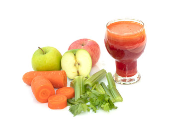Fresh, healthy juice in a glass with carrots, apple and celery stalks, Vegetable juice isolate on white background