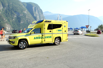 WALLDAL, NORWAY - July 2019: yellow ambulance car in Norway