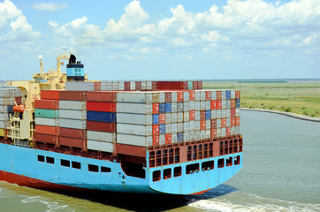 Cargo container ship entering port of Savannah, Georgia. 