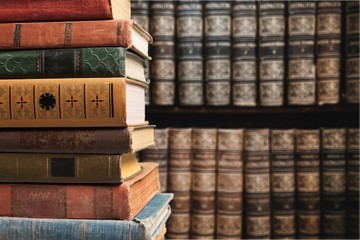 Old Books stacked on background.