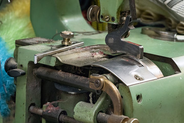 Close up of the head of a shoemaker Leather Skiving Machine.