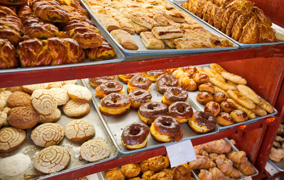 Fototapeta Street bakery selling fresh pastry on a colorful Puebla streets in Zocalo historic city center