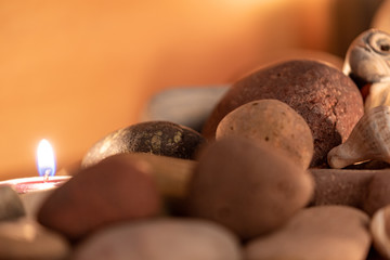 energetic stones, soft light and aromatic candles for yoga session