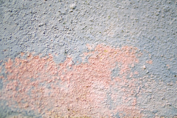 old grey paint on concrete.selective focus