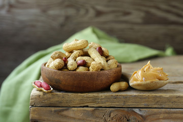 natural organic peanut butter on a wooden table